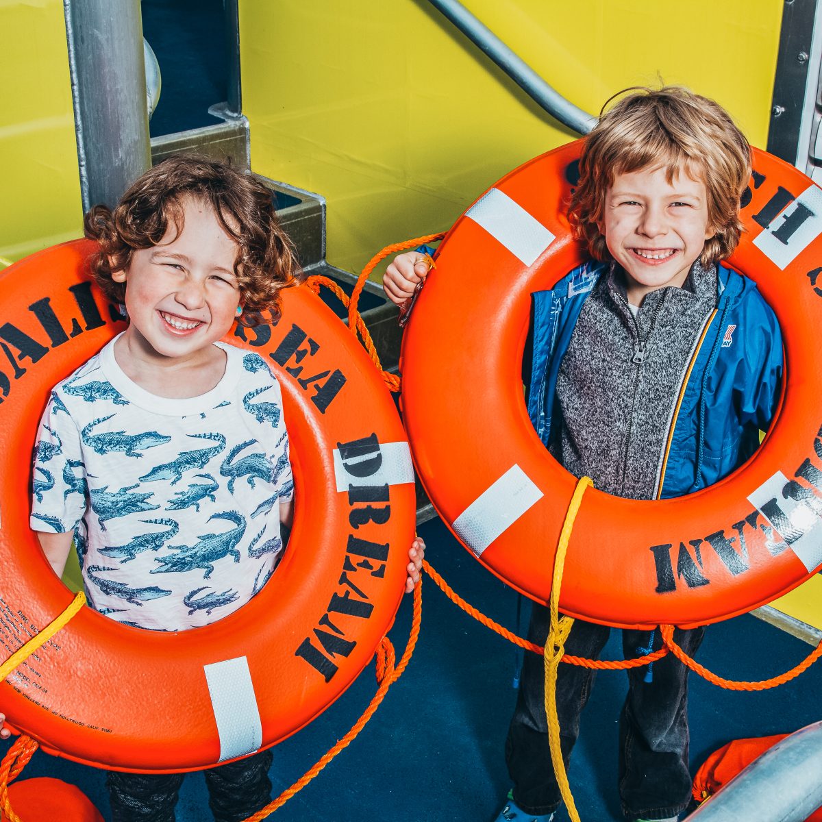 Children Smiling on Boat