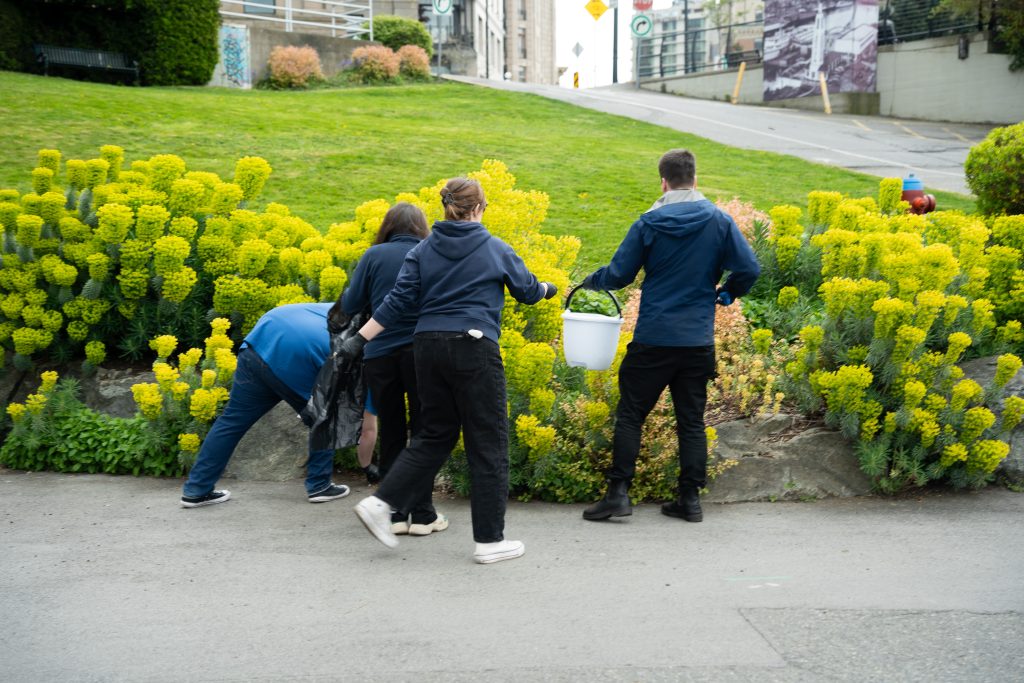 Crew picking up garbage
